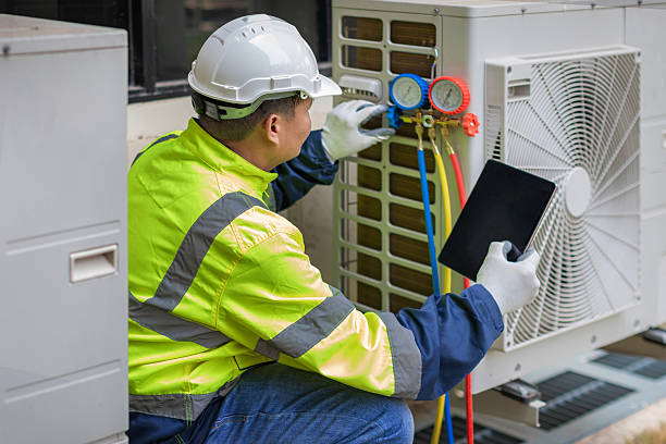 Professional Heat Pump Repair technician working in Caroga Lake, NY